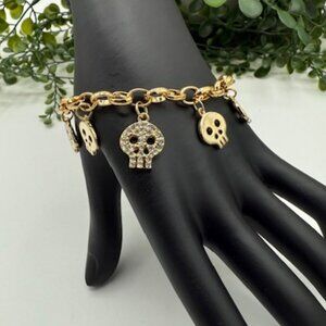 Nordstrom CARA New York Gold Tone Charm Bracelet with Glittering Skulls
